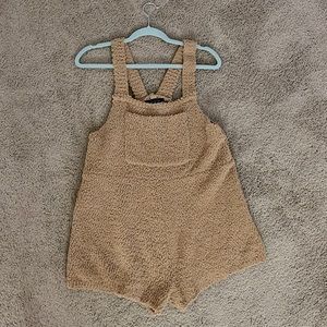 Fuzzy teddy bear overall shorts.